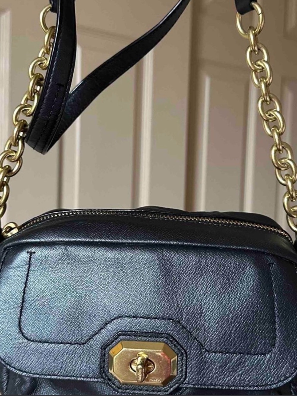 Black Leather Coach Crossbody Bag with Gold Chain Strap